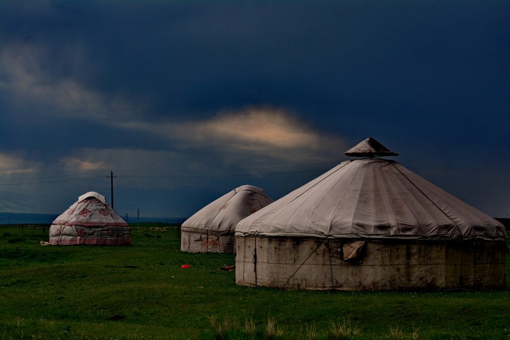 A Kazakh yurt of nomad family at grassland in Xinjiang, China.