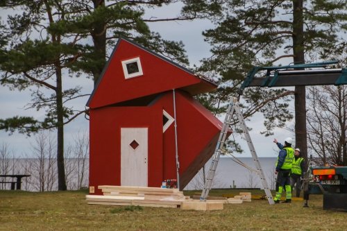 Example of folding house being assembled