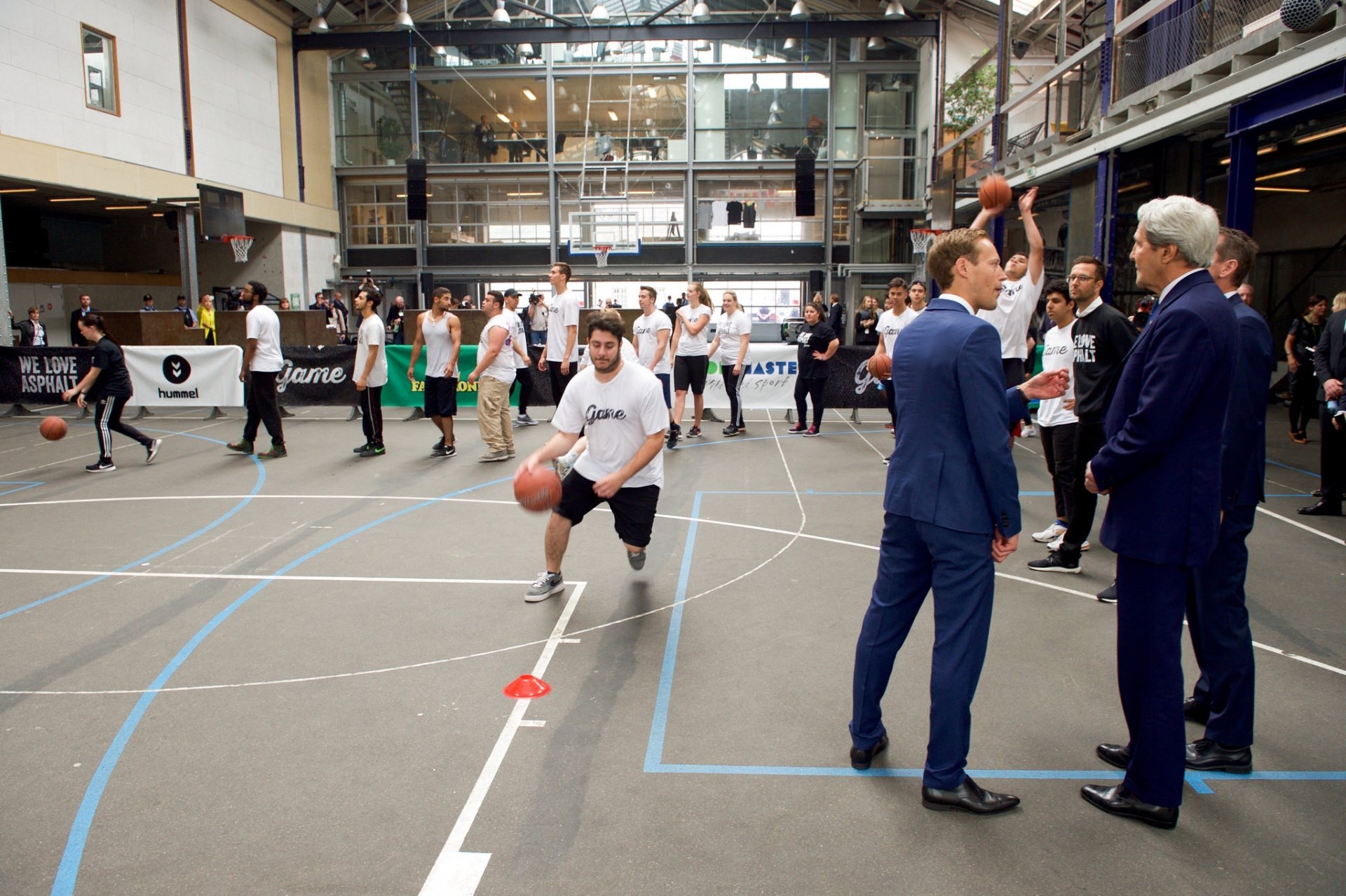Former Secretary of State John Kerry at a basketball clinic in Copenhagen