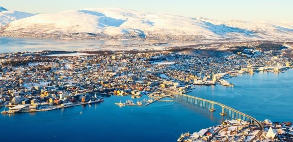 Above view of beautiful winter landscape of snow covered town Tromsoe in Northern Norway