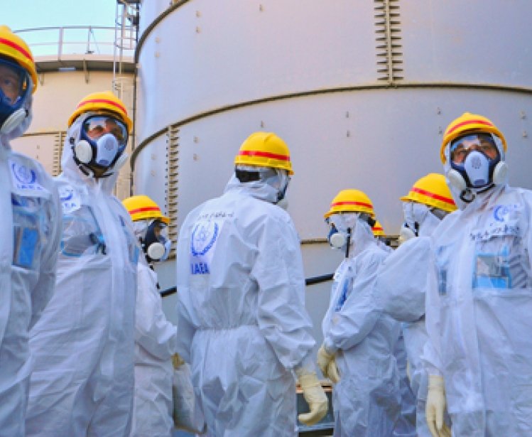 Water Storage Tank. A team of IAEA experts check out water storage tanks TEPCO's Fukushima Daiichi Nuclear Power Station on 27 Nov 2103. Greg Webb/IAEA