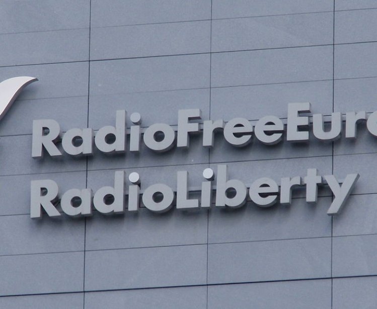 Logo of Radio Free Europe/Radio Liberty on its newly constructed building in Prague