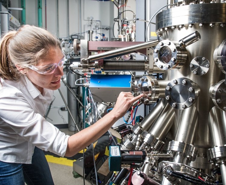 NREL scientist uses a Compound Semiconductor Molecular Beam Epitaxy System
