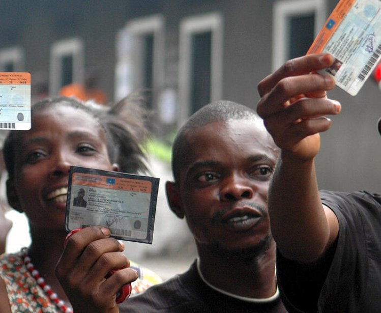 Congolese with their voting cards