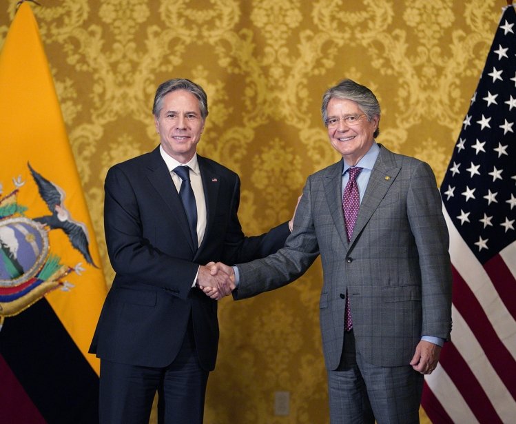 US Secretary of State Antony Blinken and President of Equador Guillermo Lasso shake hands