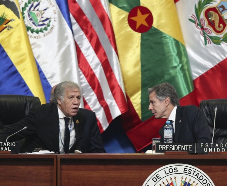 U.S. Secretary of State Antony J. Blinken, right, talks with Secretary General of the Organization of American States (OAS) Luis Almagro at the 52nd OAS General Assembly in Lima, Peru, Thursday, Oct. 6, 2022.