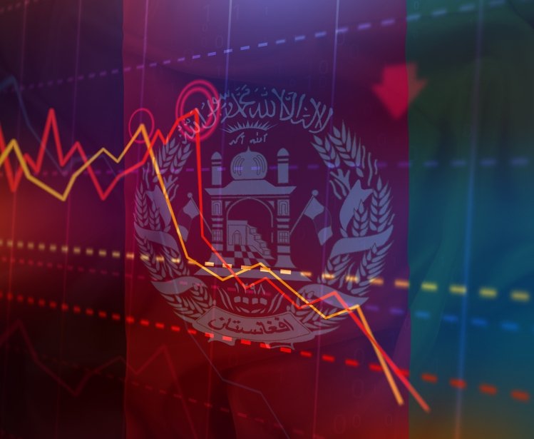 A graphic showing a line chart that is decreasing with the Afghanistan flag in the background.