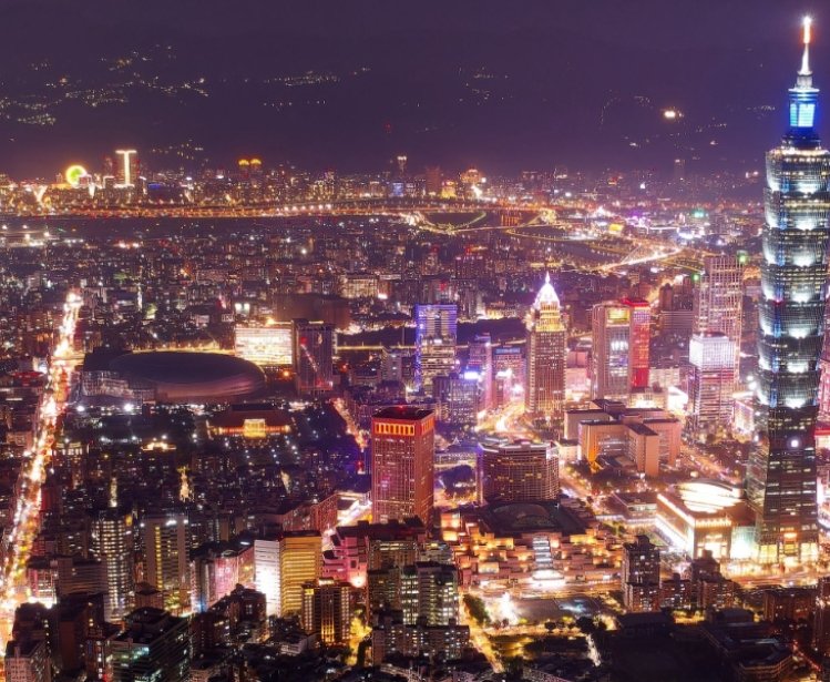 An aerial view of the city of Taipei at night.