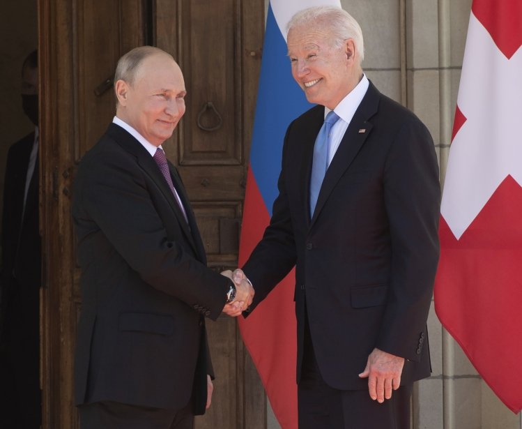 Putin and Biden Shaking Hands