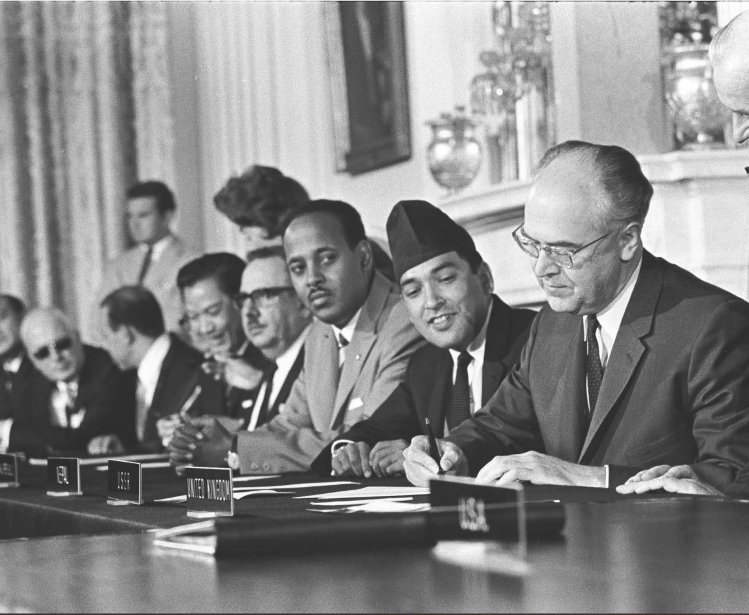 Soviet ambassador Anatoli Dobrynin signs the NPT in 1968