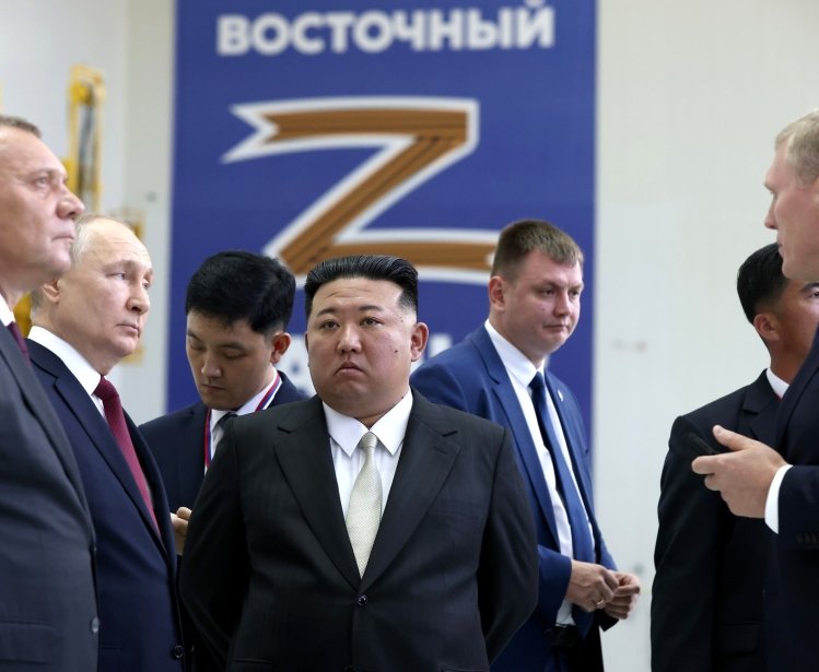 With Chairman of State Affairs of the DPRK Kim Jong-un (center) during an inspection of the Vostochny Cosmodrome. Explanations are given by the head of Roscosmos Yuri Borisov (left) and the general director of the Center for the Operation of Ground-Based Space Infrastructure Nikolai Nestechuk (right).