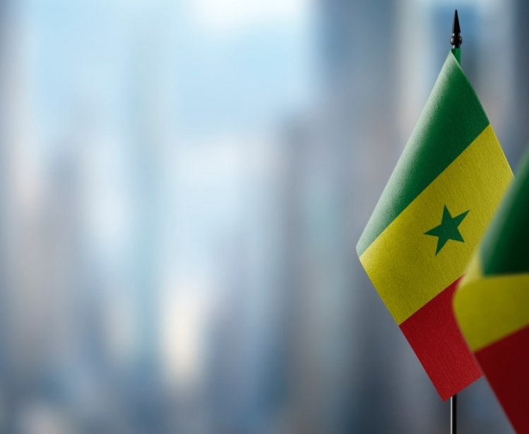 Flags of Senegal with Blurred Backdrop
