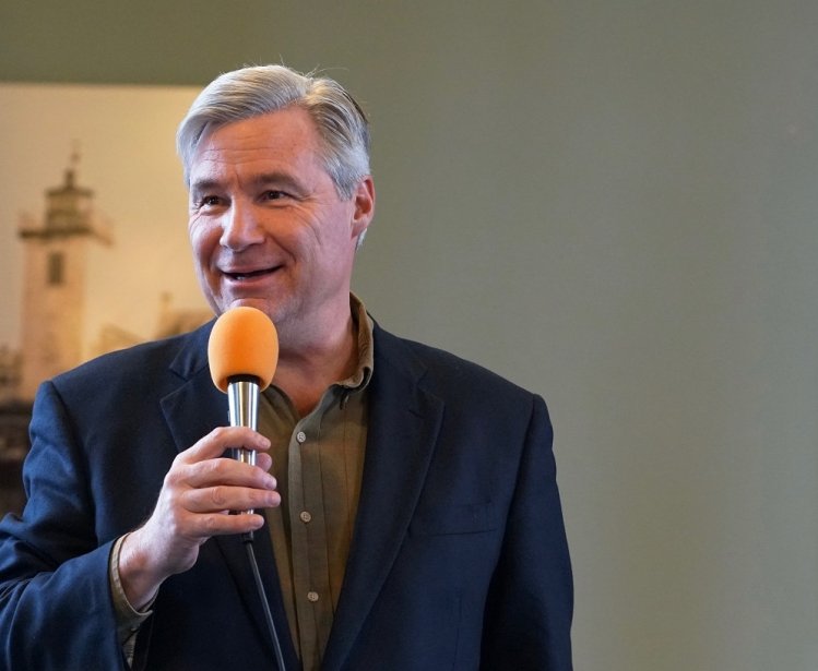 Sen. Sheldon Whitehouse speaks into a microphone