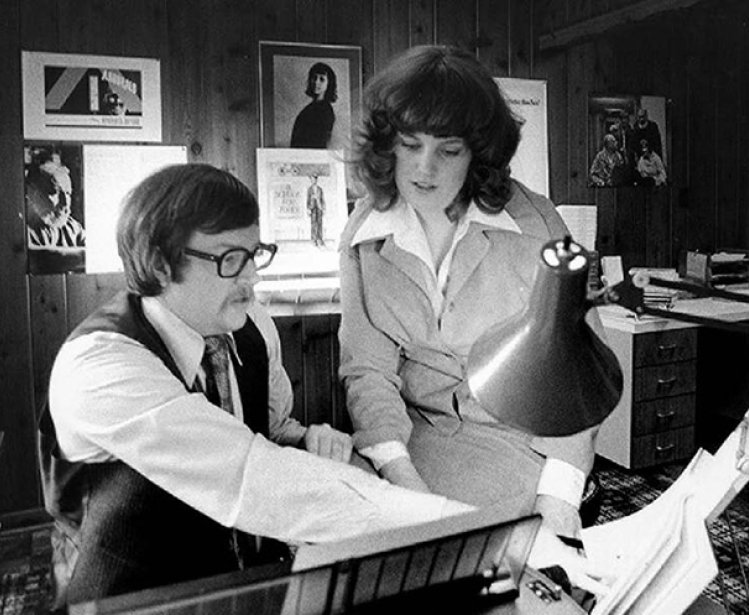 Black and White photo of man and woman in studio