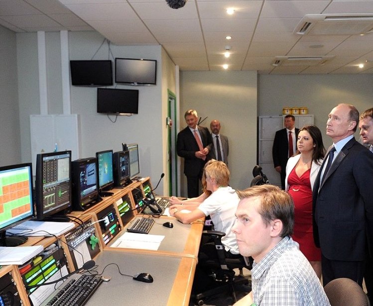 Vladimir Putin visits the Russia Today television studio