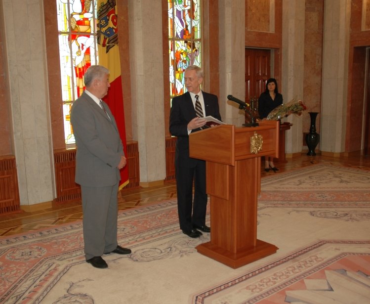 Picture of William H. Hill (right) with Vladimir Voronin, taken by the Moldovan Presidential Administration, June 2006. Hill was receiving an award at the end of his term as OSCE Head of Mission