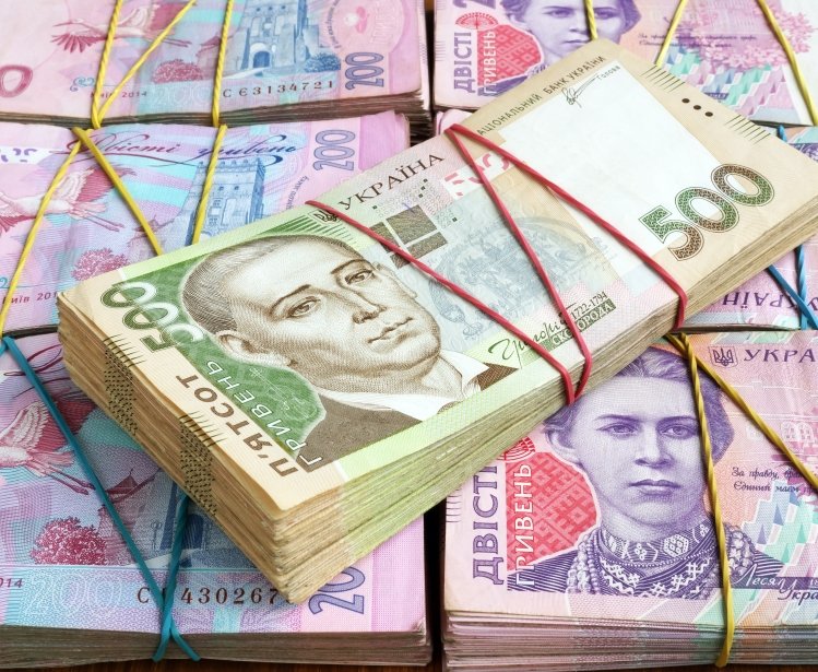 Image: Stacks of Ukrainian hryvnia UAH banknotes.