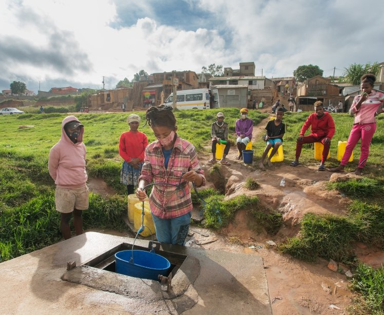 Fenosoa, like many who live in the Amoron’Akona neighborhood, works by supplying dozens of households and businesses with well water in Amoron ‘Akona, Antananarivo, Madagascar