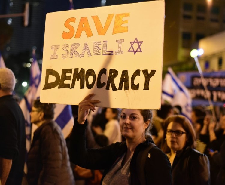 TEL AVIV, ISRAEL - February 25 2023: Israelis protest at Tel Aviv against Netanyahu's Judicial Coup