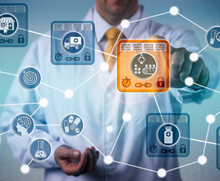 Unrecognizable pharmaceutical logistician using internet of things solution based on blockchain technology to secure data integrity of drug supply chain. Networking concept for distributed ledgers.