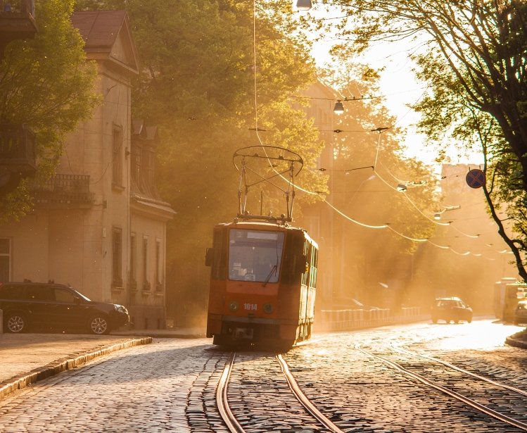 Old orange tram in backlight. Lviv (Lvov), Ukraine