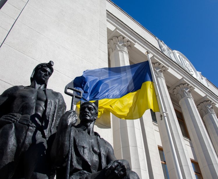 lag in front of the facade of the building of the Verkhovna Rada of Ukraine, June 2019
