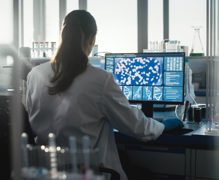 Scientist working on a computer