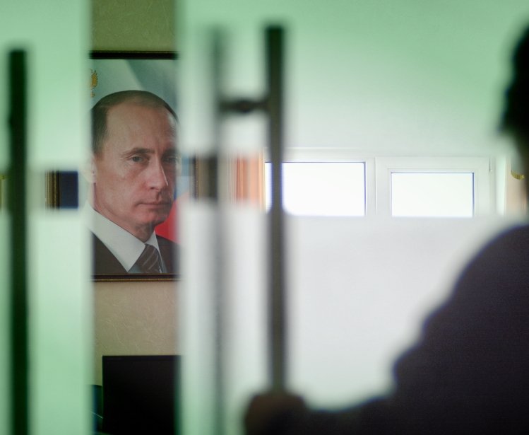 Moscow, Russia-September 24, 2019.A portrait of Vladimir Putin, the President of Russia, hangs on the wall in the room