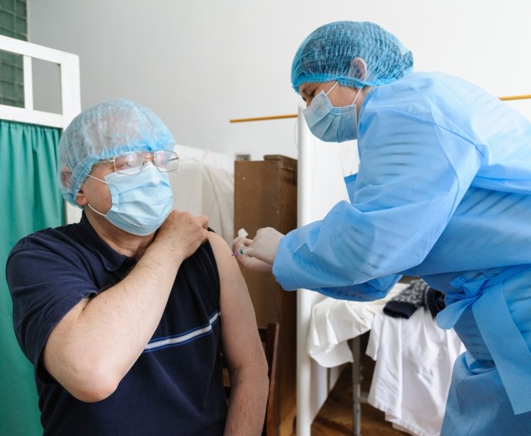 18 march 2021. Lviv, Ukraine. A health worker gets a shot of the AstraZeneca (Covishield) vaccine at the hospital. The Ministry of Health of Ukraine has publicly vaccinated health workers first