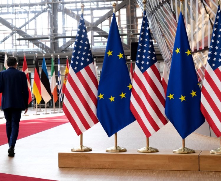 European and US flags in European Council in Brussels
