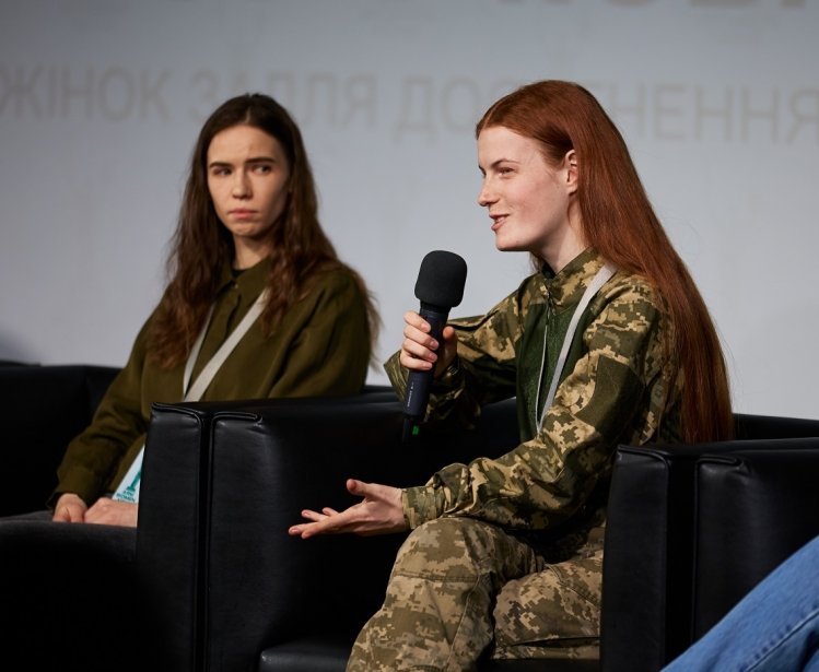 Oksana Rubaniak speaks at forum Arm Women Now in Kyiv