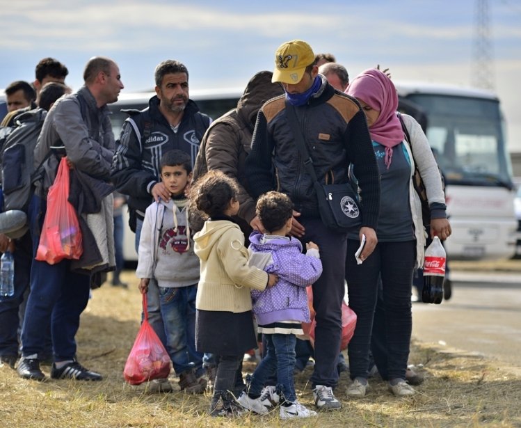 Refugees entering a refugee camp