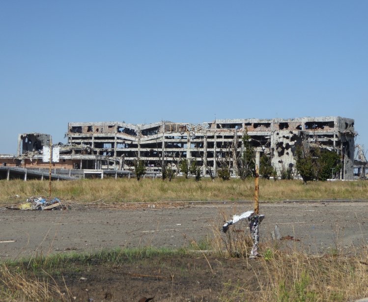 DONETSK, UKRAINE - AUGUST 29, 2016: Ruins of Donetsk Airport, new terminal, near demarcation line separating Ukrainian and Donetsk People's Republic forces.