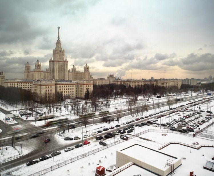 Main building of Moscow State University at winter in Moscow, Russia, view through window