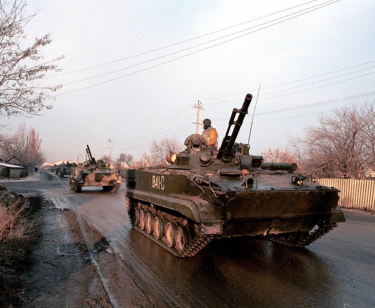  A column of Russian army armor makes its way south from a Russian army base towards the front lines of Chechnya on January 12, 2000 in Mozdok, Russia