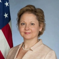 Ambassador Christine A. Elder