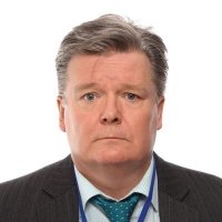 Petteri Vuorimäki in green tie