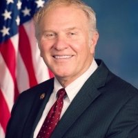 A portrait of Congressman Steve Chabot standing in front of an American flag.