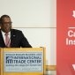 Brian Nichols with Canada Institute Banner