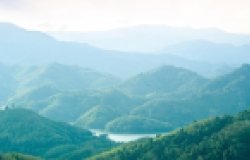Green mountains and beautiful sky clouds under the blue sky
