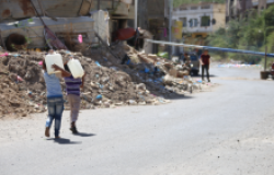 Children fetch water during a crisis in Taiz, Yemen.