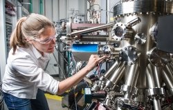 NREL scientist uses a Compound Semiconductor Molecular Beam Epitaxy System
