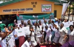 Health workers celebrating the launch of the Basic Health Care Provision Fund (known as ‘huwe’) in Nigeria.