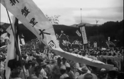 A banner with Korean text flies during a celebration.