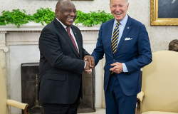 President Joe Biden and South African President Cyril Ramaphosa shake hands in the Oval Office