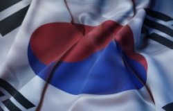 The flag of South Korea, bunched up to show the texture of the fabric.