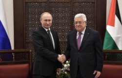 Vladimir Putin of Russia and Mahmoud Abbas of Palestine shaking hands