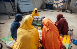 Hauwa Mustapha, 30, interacts with other women during mother-mother session within their community at Sulubri, Maiduguri, Borno, Nigeria.