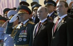 Sergey Shoigu, Vladimir Putin and Dmitry Medvedev at the military parade marking the 69th anniversary of Victory in the Great Patriotic War.