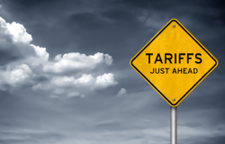 Yellow sign that reads tariffs ahead